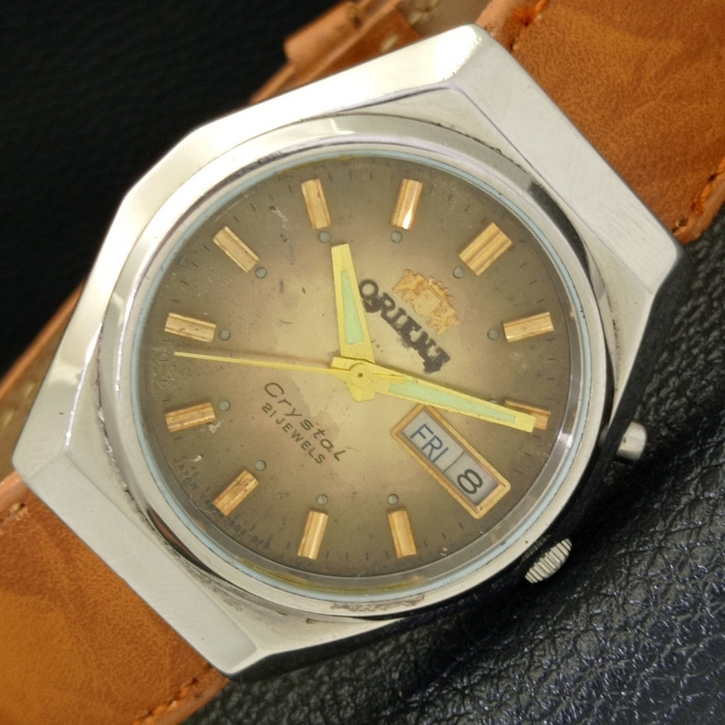 Vintage 1973 Orient Automatic Mens Silver Watch WDaydate  Gold Accents